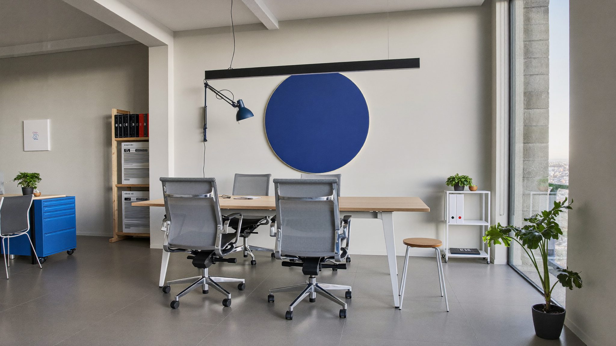 Small office with a phone and notepad